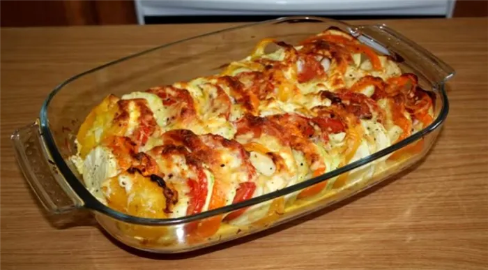 Запеченные кабачки в духовке с помидорами, сыром и чесноком