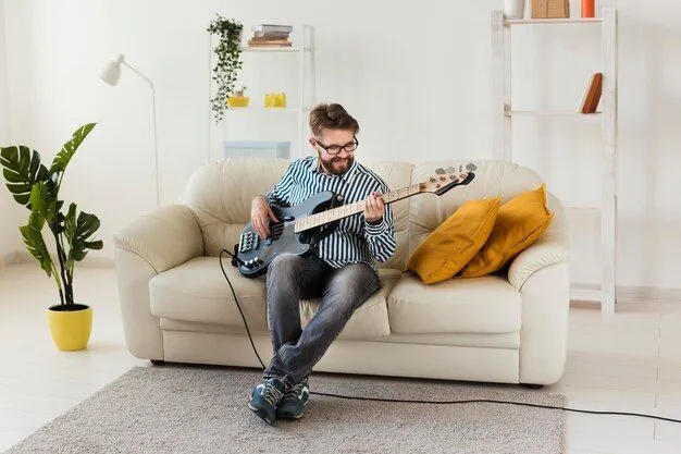 man-at-home-playing-electric-guitar_23-2148614522.jpg